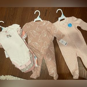 Brand new with tags baby girl pajamas and 5 pack of onesies